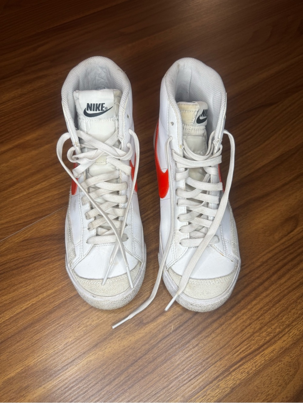 Nike Kids White High-Top Sneakers with Red Swoosh